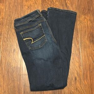 Dark wash American Eagle Kick boot pants